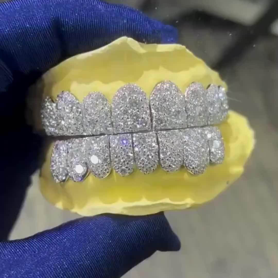 Only 1 left and in 20+ baskets Price:£180.19+ Original Price:£300.31+ New markdown! 40% off Local taxes included (where applicable) Customised Fit Invisible Set Grillz flawless diamond grillz Silver with VVS Moissanite Iced Out honeymoon set grillz With Free Mold Kitz