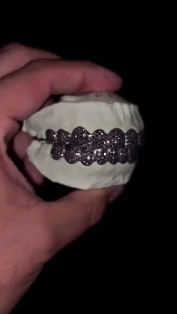 Only 10 left and in 1 basket Price:£364.02+ Original Price:£455.02+ 20% off Local taxes included (where applicable) VVS Moissanite Grillz in 925 Sterling Silver, Black Moissanite Grillz, Diamond Tester Approved