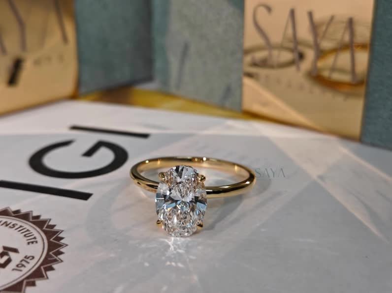 Only 2 left and in 20+ baskets NowPrice:£526.19+ Original Price:£1,052.39+ 50% off Local taxes included (where applicable) IGI Certified Oval Lab Grown Diamond Engagement Ring - White/Yellow Solid Gold #fyp #fypシ゚viral🖤tiktok #everyone 